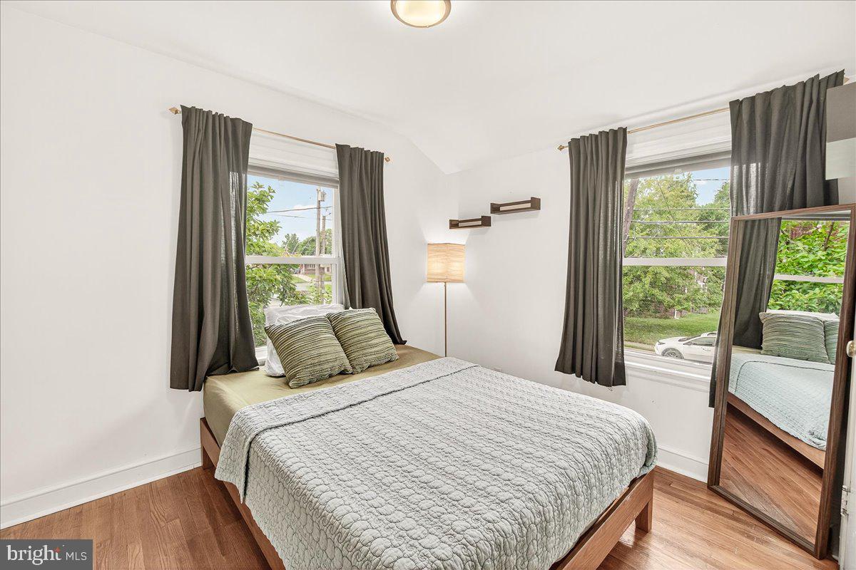 22 Norva Avenue Frederick, MD 21701 - Photo 17 of 37 a bedroom with a large bed and a large window