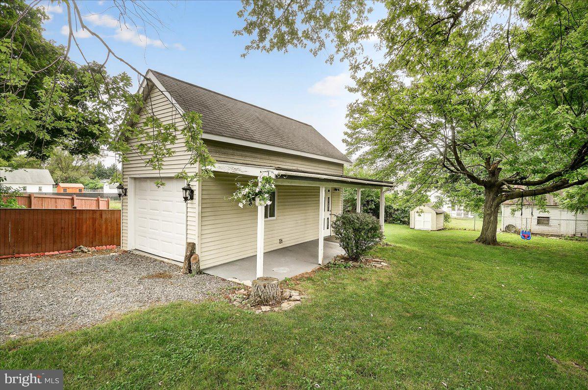 22 Norva Avenue Frederick, MD 21701 - Photo 23 of 37 a view of a backyard with a large tree