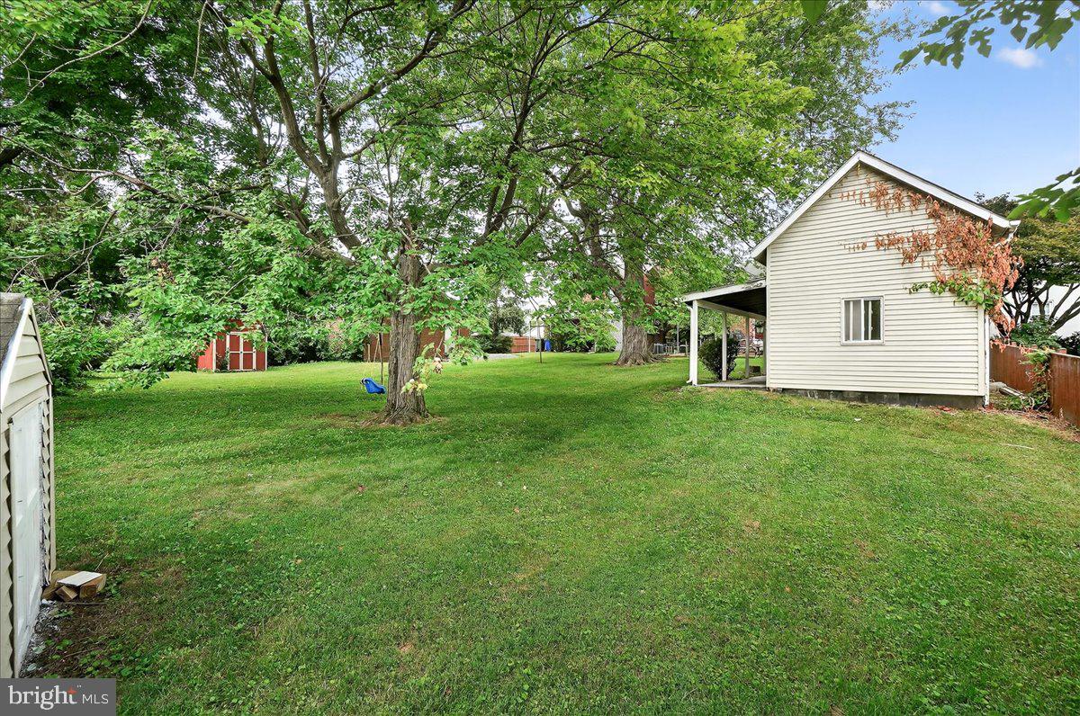 22 Norva Avenue Frederick, MD 21701 - Photo 25 of 37 a front view of a house with a yard