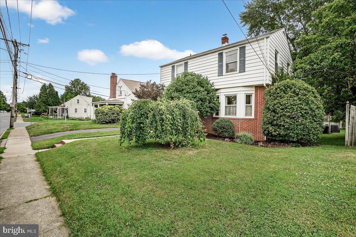 22 Norva Avenue Frederick, MD 21701 - Photo 3 of 37 a front view of a house with a yard