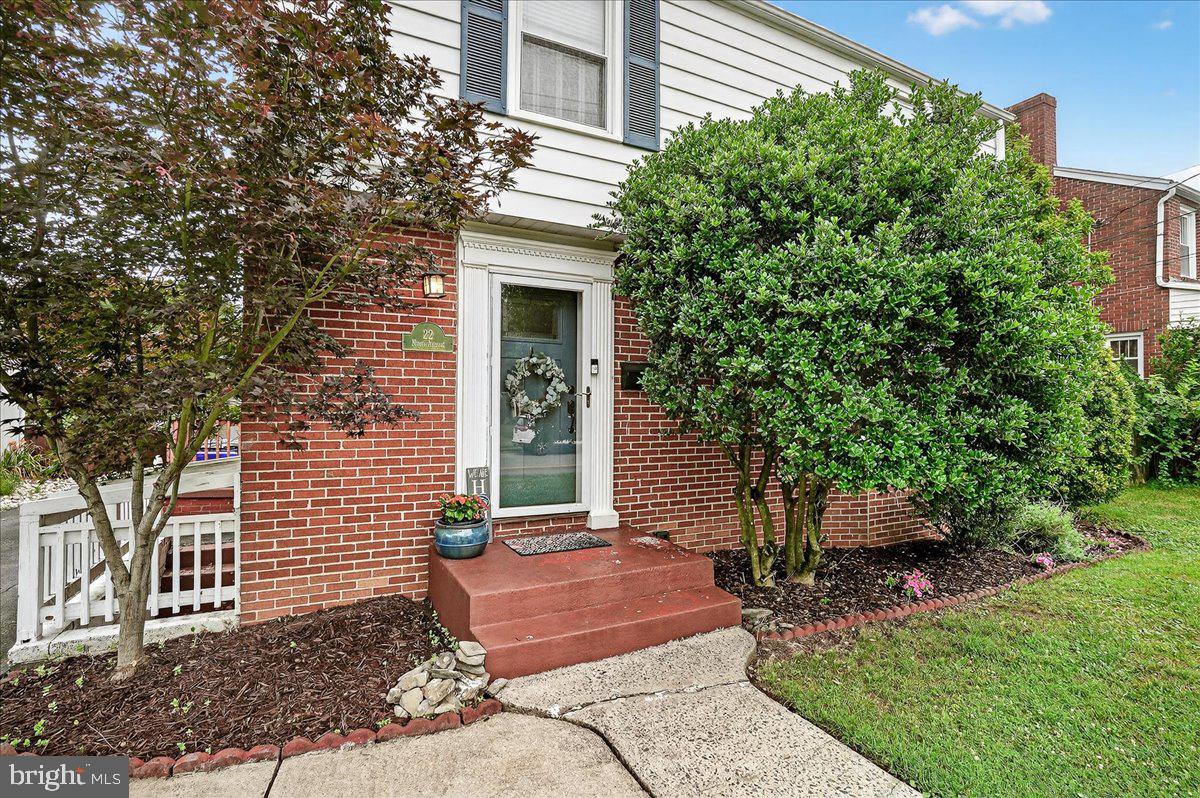 22 Norva Avenue Frederick, MD 21701 - Photo 5 of 37 a front view of a house with a yard