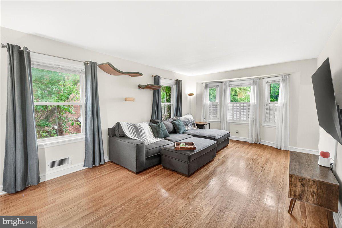 22 Norva Avenue Frederick, MD 21701 - Photo 8 of 37 a living room with furniture and a flat screen tv