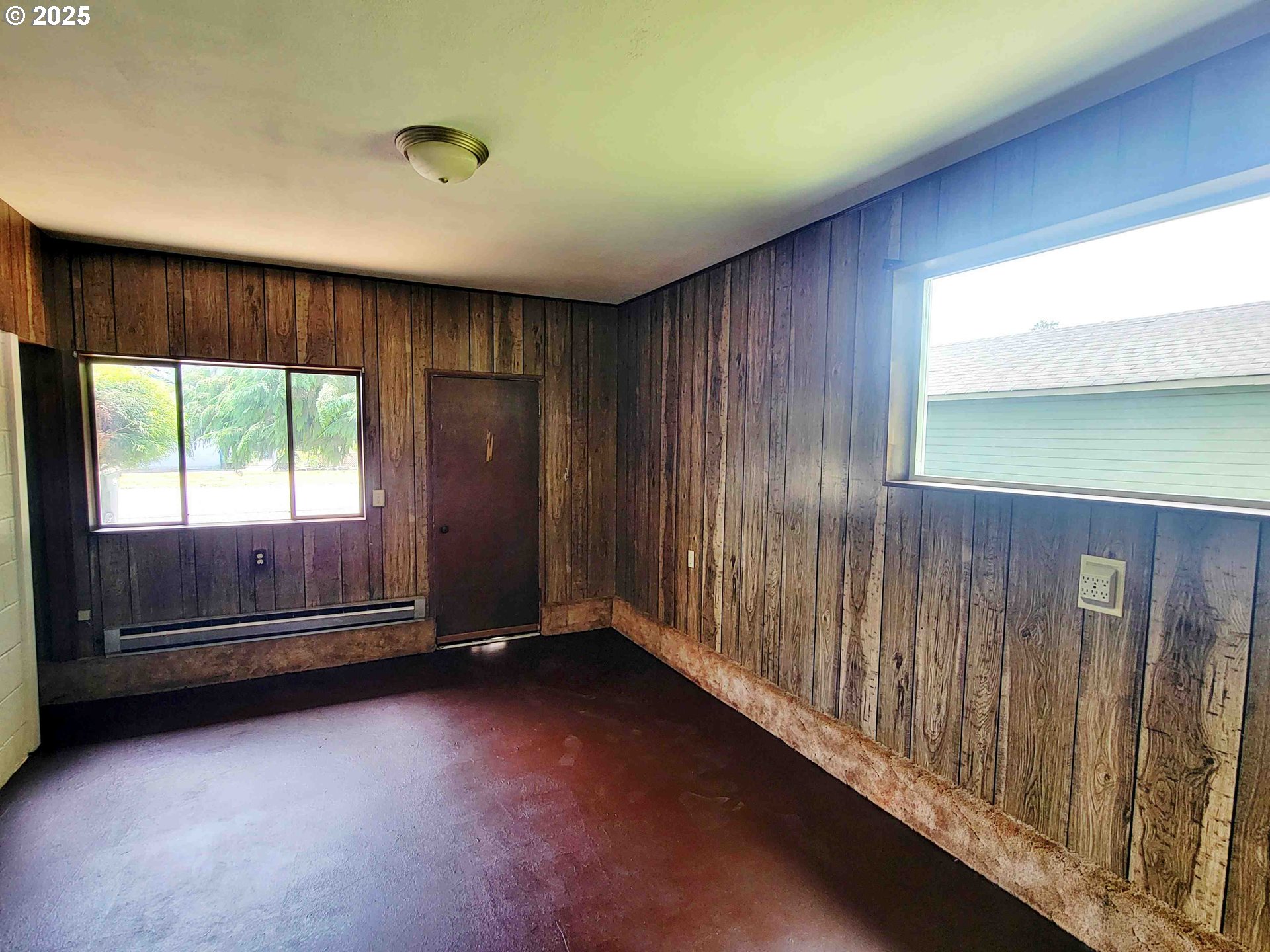 300 Maple Street Toledo, WA 98591 - Photo 13 of 19 a view of an empty room with a window