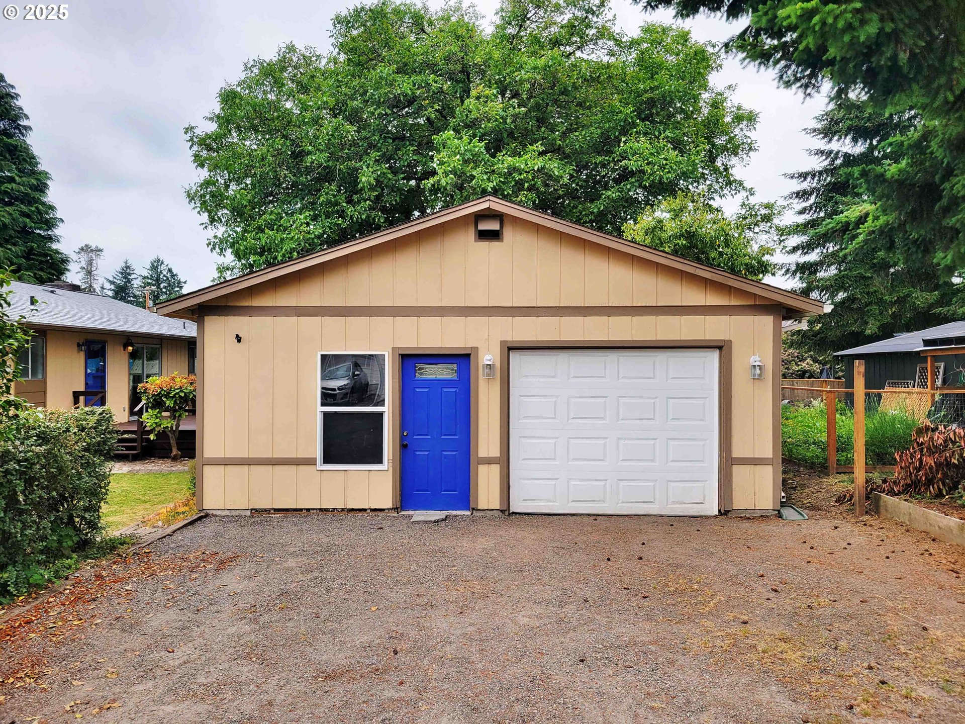 300 Maple Street Toledo, WA 98591 - Photo 2 of 19 a front view of house with garage and yard