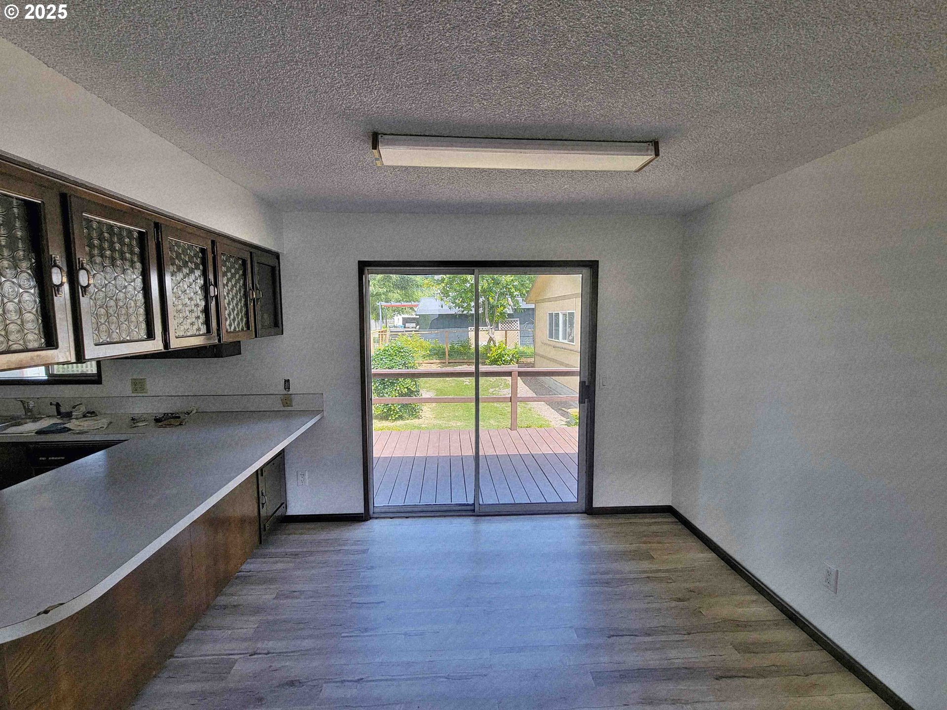 300 Maple Street Toledo, WA 98591 - Photo 5 of 19 a bathroom with a sink and a large mirror