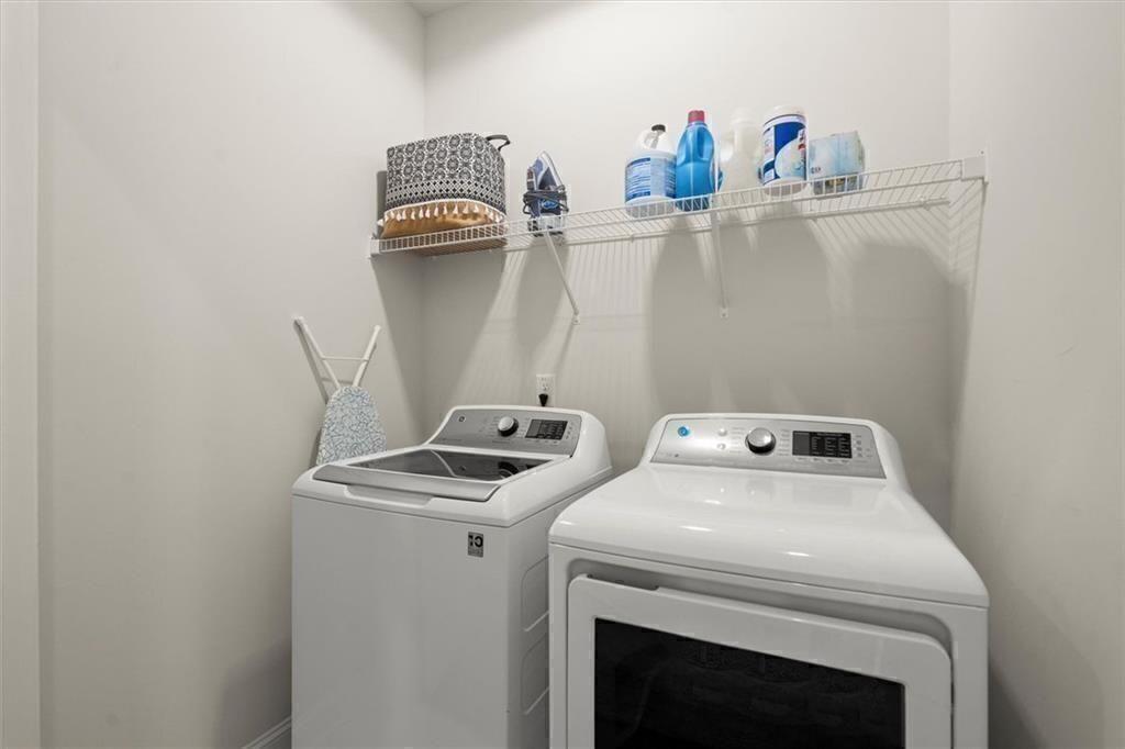 209 Phillips Lane Alpharetta, GA 30009 - Photo 17 of 48 a utility room with dryer and washer