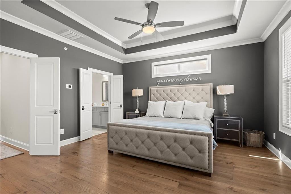 209 Phillips Lane Alpharetta, GA 30009 - Photo 20 of 48 a bedroom with a bed and a table
