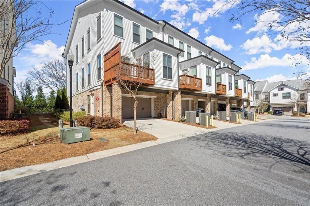 209 Phillips Lane Alpharetta, GA 30009 - Photo 33 of 48 a front view of a building with street