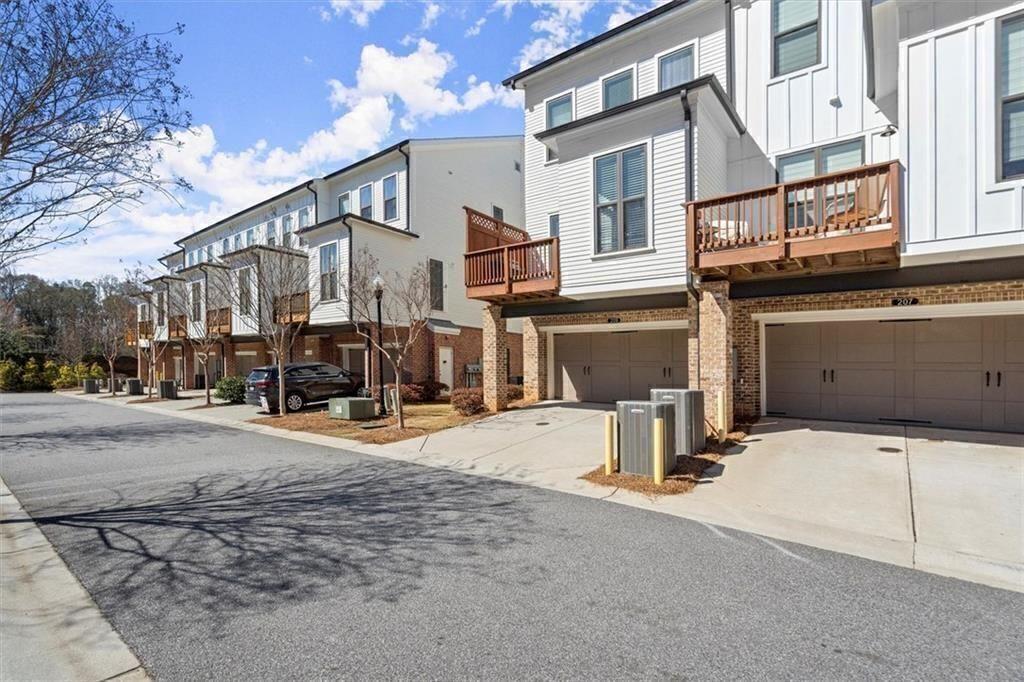209 Phillips Lane Alpharetta, GA 30009 - Photo 34 of 48 a view of a street with buildings