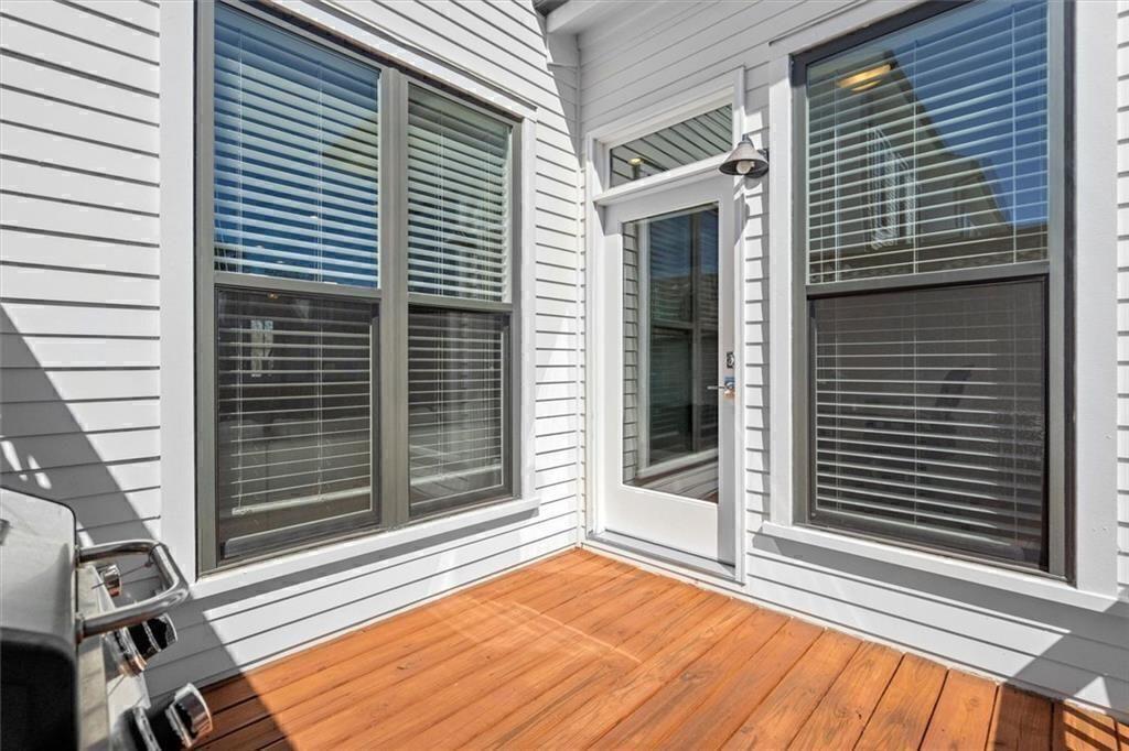 209 Phillips Lane Alpharetta, GA 30009 - Photo 42 of 48 a view of a balcony with a door and a window