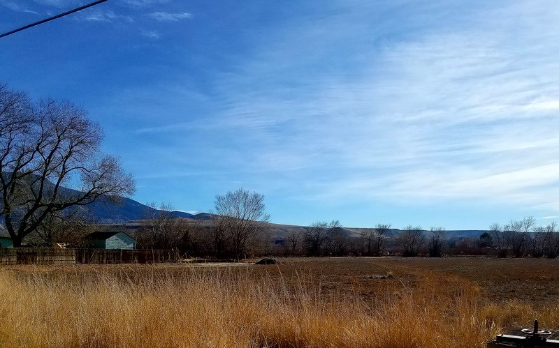 3625 G Road Palisade, CO 81526 - Photo 8 of 9 a view of lake with mountain in background