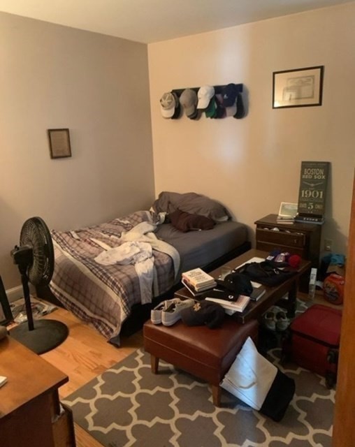 24 P Street, Unit 2 Boston, MA 02127 - Photo 6 of 10 a bedroom with bed and window