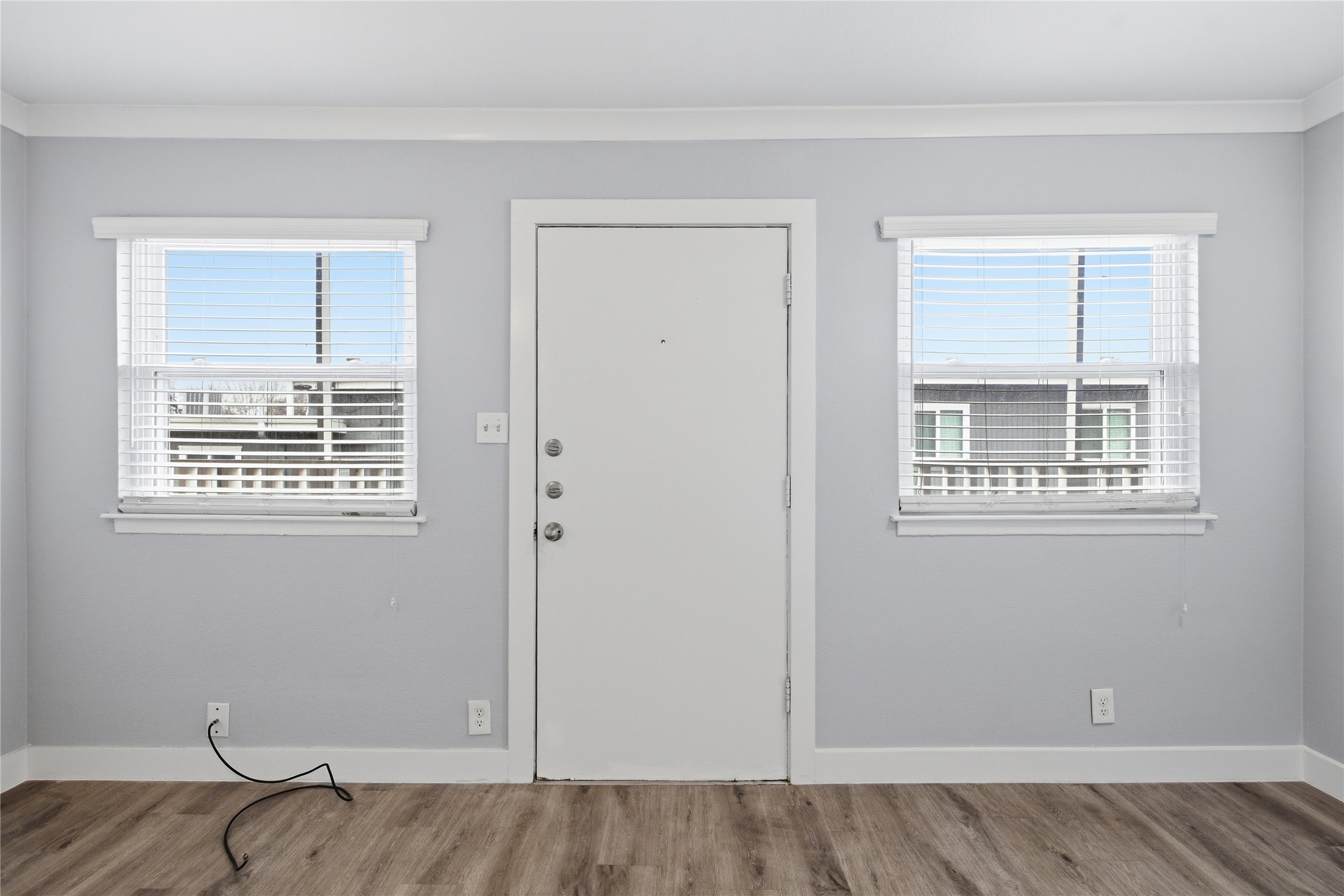 2401 Manor Road, Unit 232 Austin, TX 78722 - Photo 10 of 32 a view of an empty room with a window