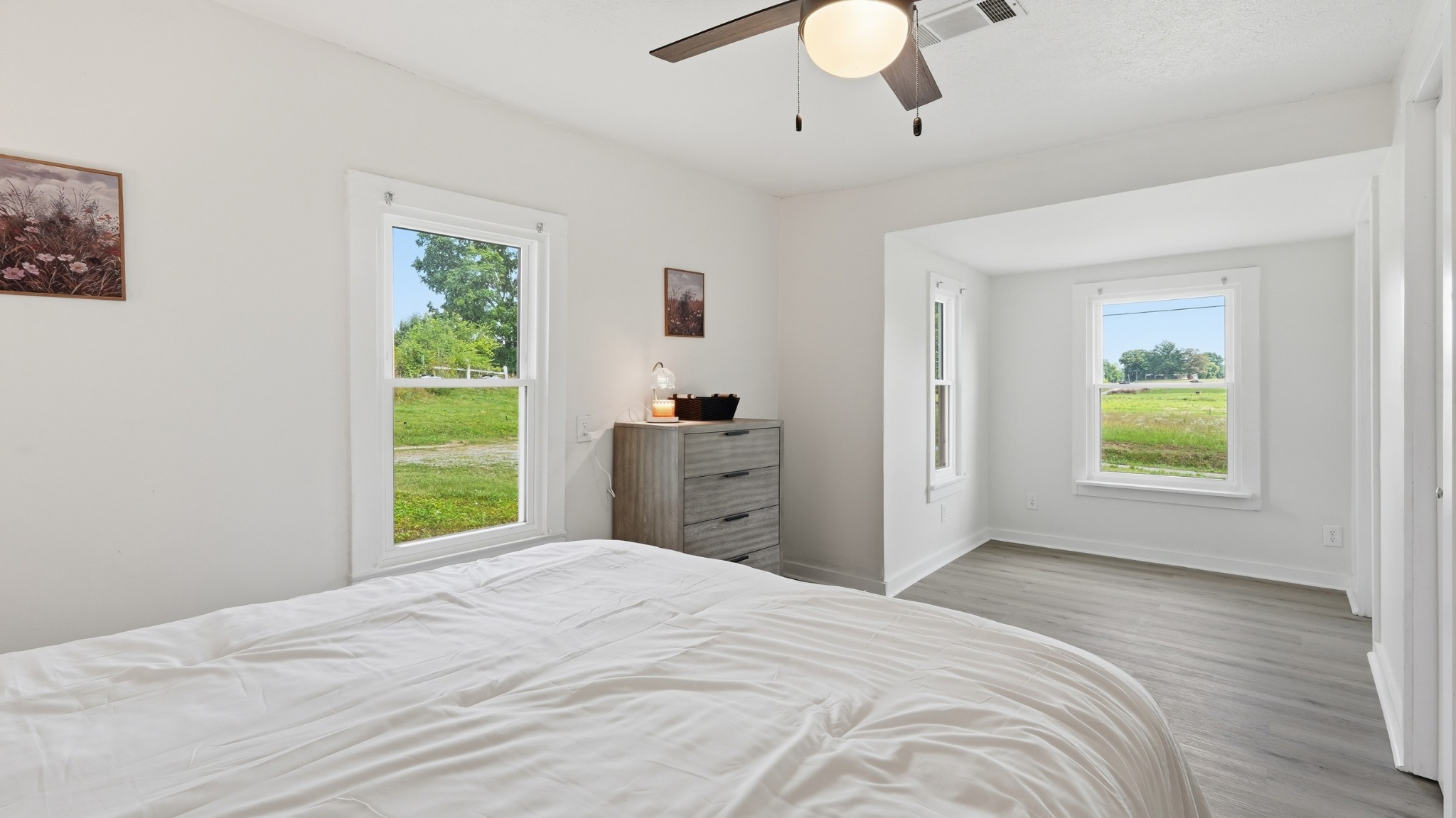 469 Fred Cooper Road McMinnville, TN 37110 - Photo 10 of 46 a bedroom with a bed and a window
