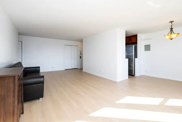 a view of balcony with wooden floor