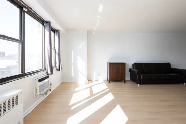 a kitchen with stainless steel appliances granite countertop a stove and a refrigerator