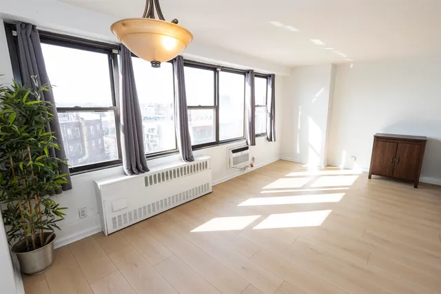 a view of a porch with a potted plant