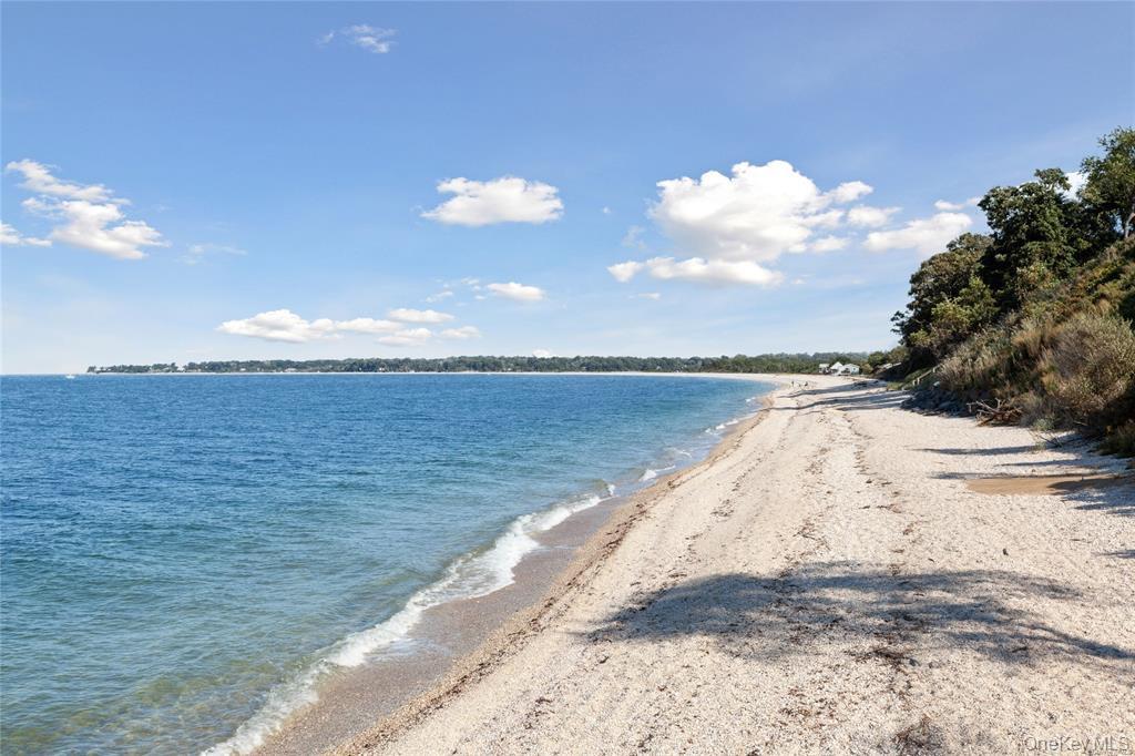 47 Crane Neck Road Setauket, NY 11733 - Photo 3 of 4 a view of an ocean beach