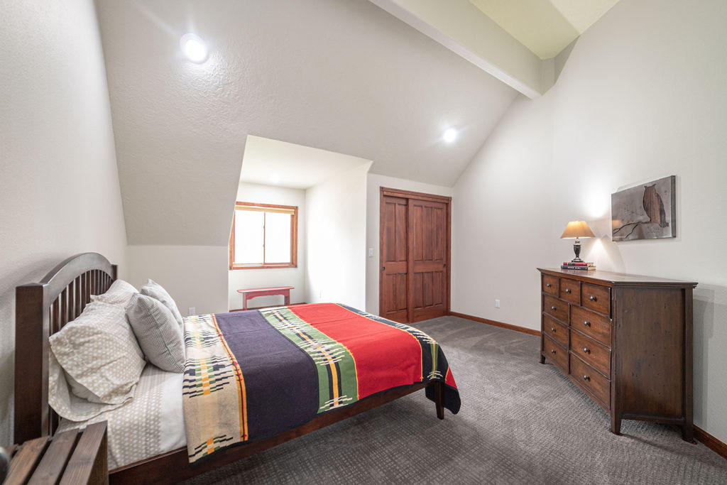 60675 Billadeau Road Bend, OR 97702 - Photo 38 of 87 a bedroom with a bed and window