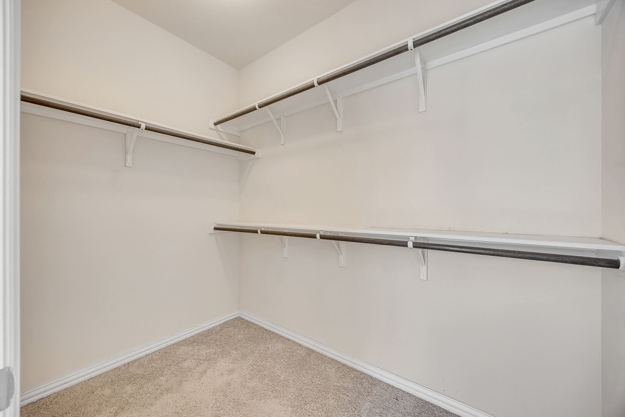 7212 Vail Ridge Street Austin, TX 78744 - Photo 19 of 26 Ample storage solutions provide practical organization for any wardrobe.