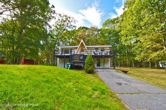 a view of balcony with furniture