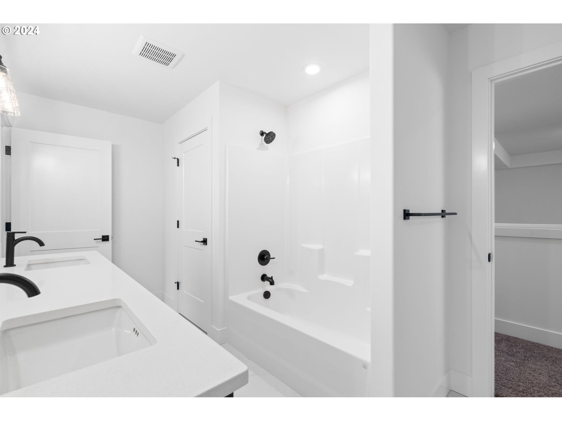 836 Northwest 175th Way Ridgefield, WA 98642 - Photo 9 of 21 a bathroom with a bathtub and a sink