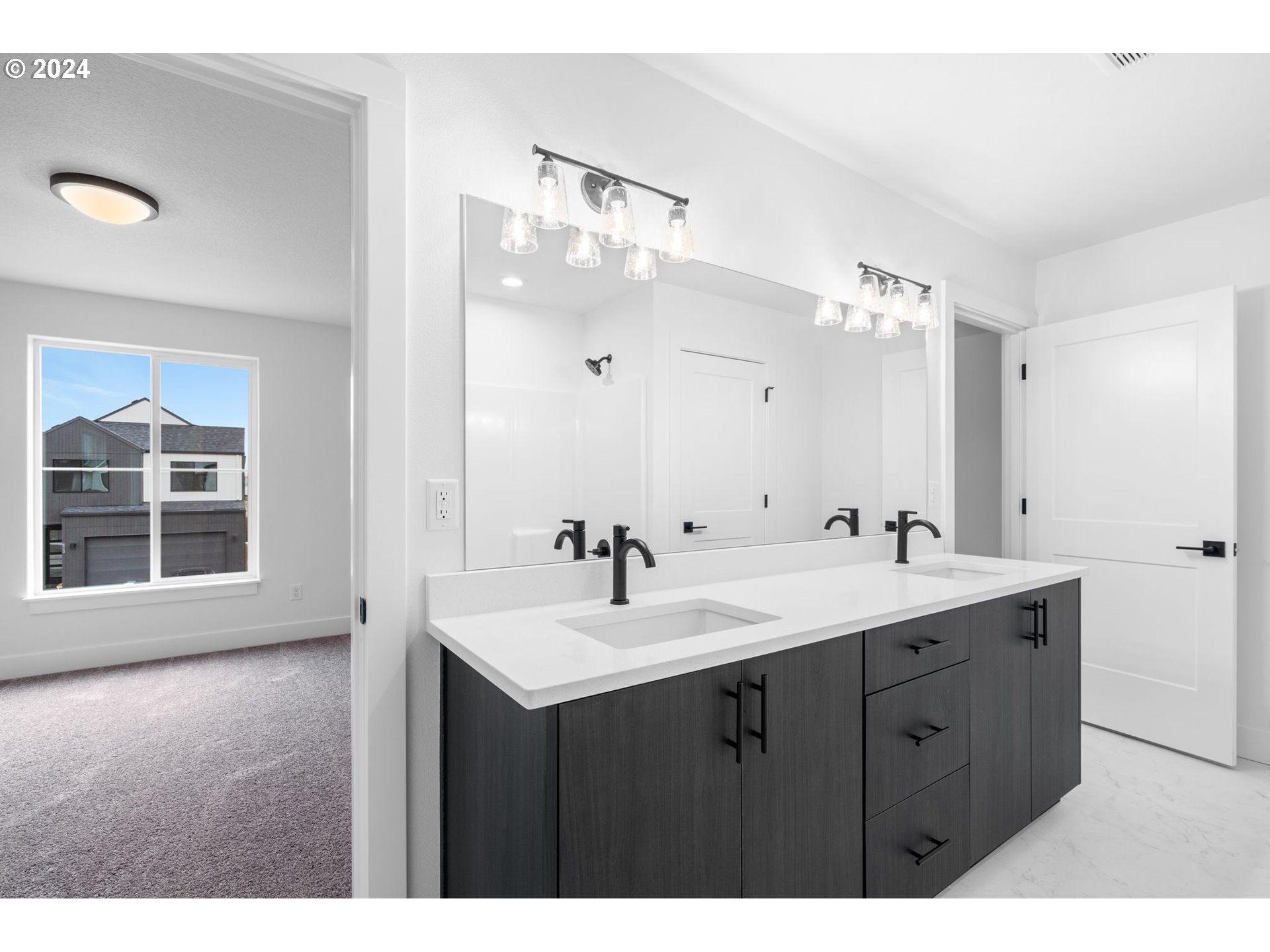 836 Northwest 175th Way Ridgefield, WA 98642 - Photo 10 of 21 a bathroom with a sink double vanity mirror and a