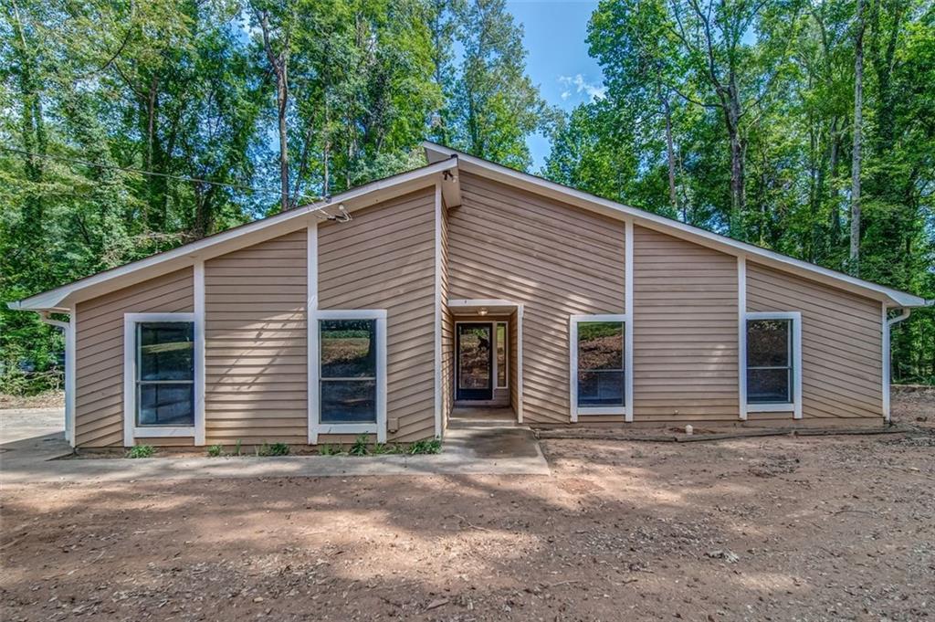 225 Chimney Ridge Trail Stockbridge, GA 30281 - Photo 1 of 1 a front view of a house