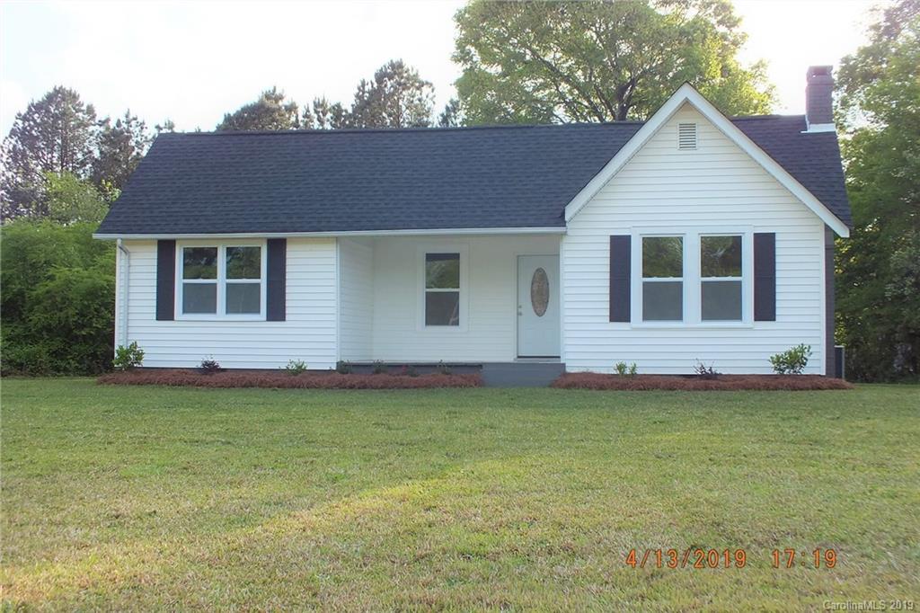 288 South Potter Road Lancaster, SC 29720 - Photo 1 of 24 a front view of a house with a garden