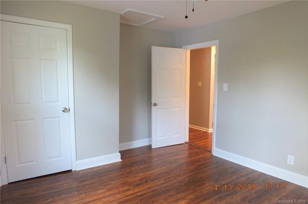 288 South Potter Road Lancaster, SC 29720 - Photo 14 of 24 a view of an empty room with wooden floor