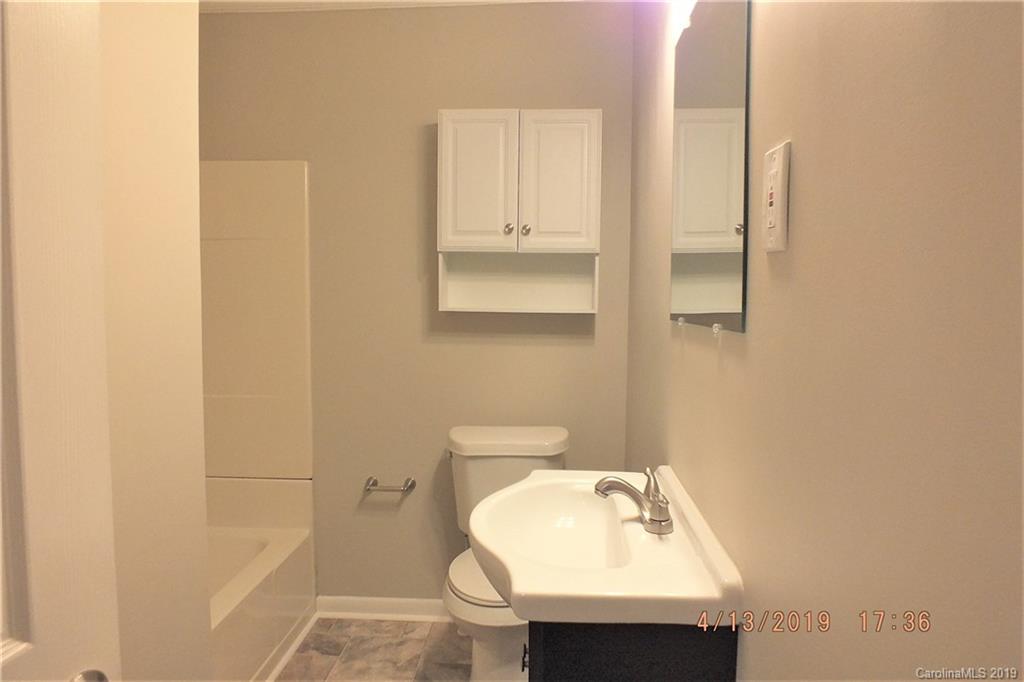 288 South Potter Road Lancaster, SC 29720 - Photo 15 of 24 a bathroom with a sink a toilet and shower