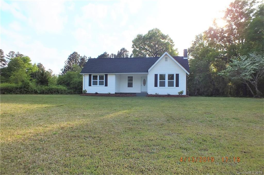 288 South Potter Road Lancaster, SC 29720 - Photo 24 of 24 a view of a house with a garden and yard