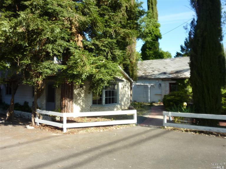 2680 Old River Road Ukiah, CA 95482 - Photo 1 of 1 a view of house with backyard and sitting area