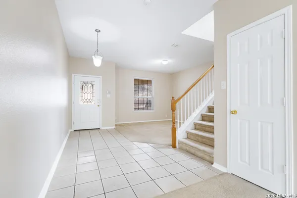 a view of an entryway with stairs