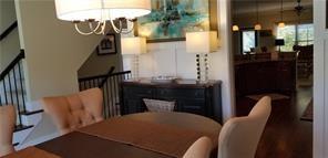 2436 Dresden Parc Circle Atlanta, GA 30345 - Photo 13 of 17 a bedroom with furniture and a chandelier