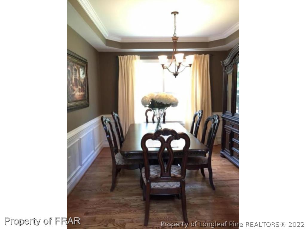 103 Sandy Springs Road Aberdeen, NC 28315 - Photo 25 of 25 a view of a dining room with furniture and window