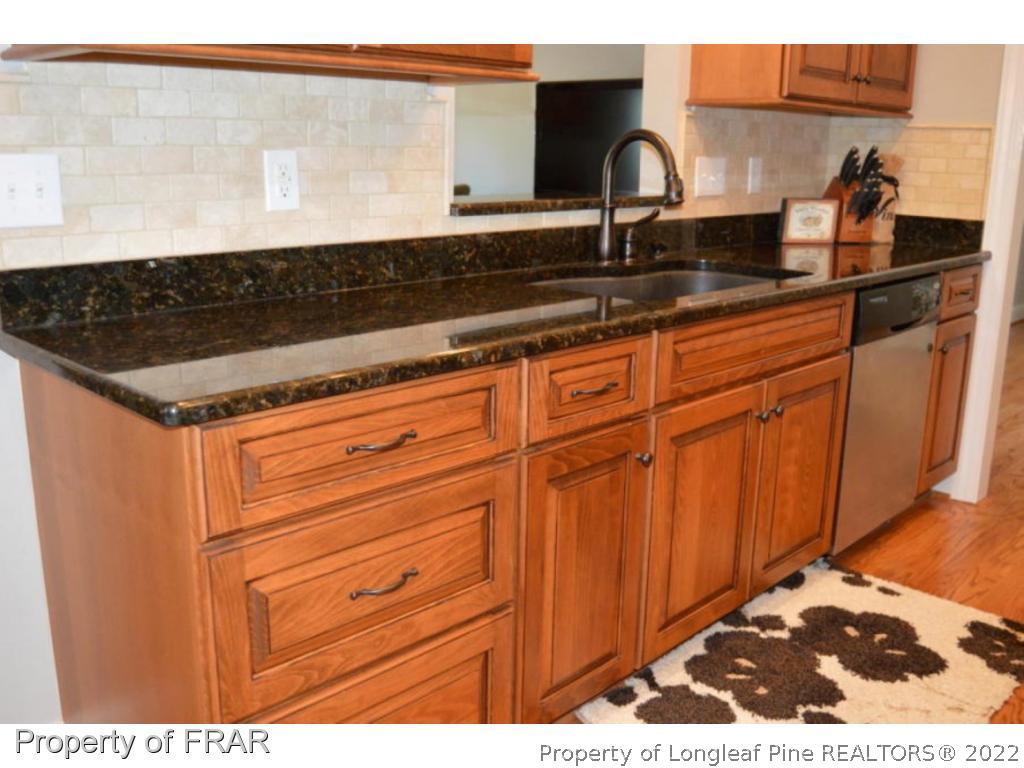 103 Sandy Springs Road Aberdeen, NC 28315 - Photo 7 of 25 a close view of sink and tap