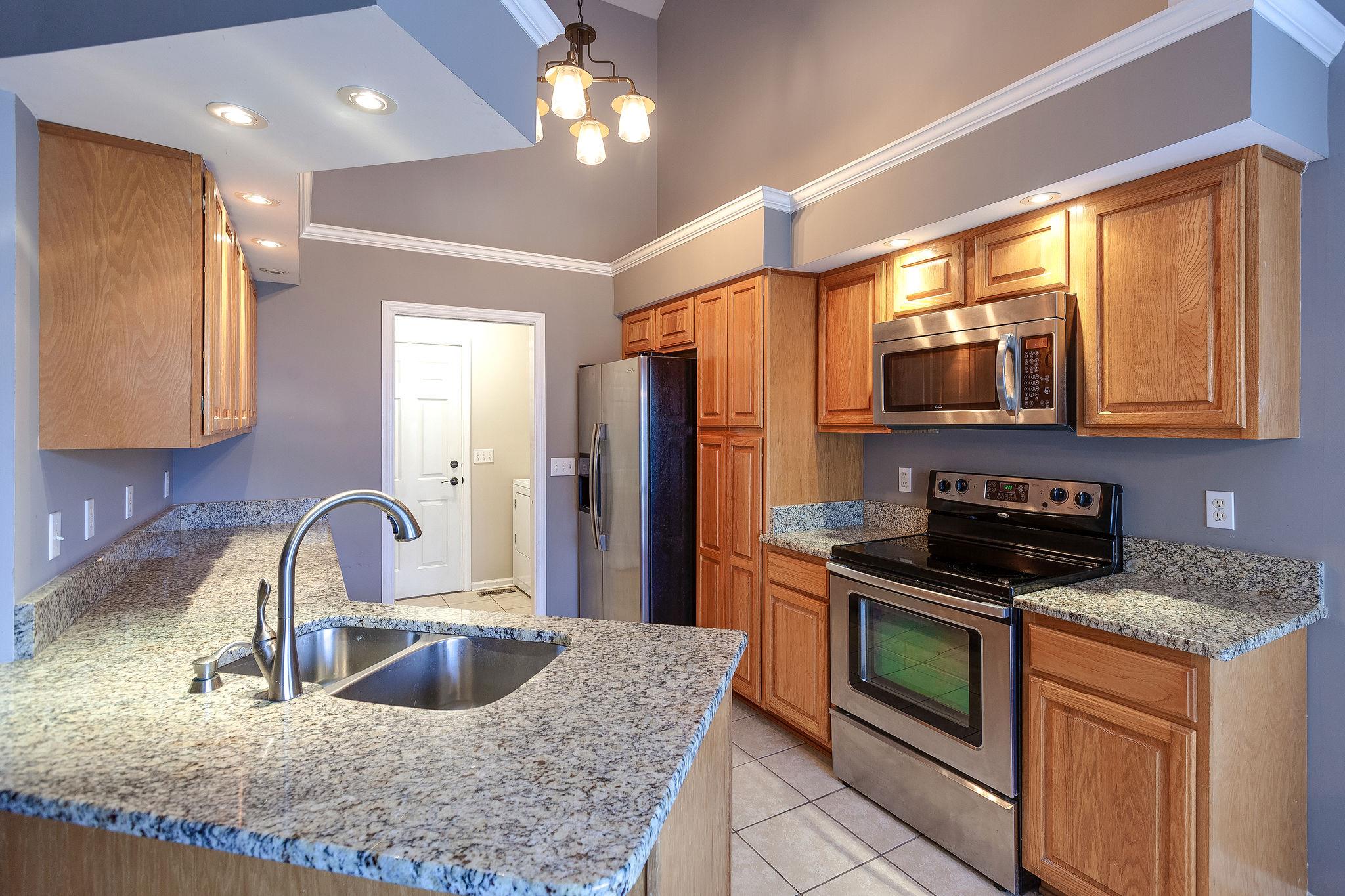 1815 O'Reilly Circle Spring Hill, TN 37174 - Photo 3 of 23 *Kitchen with Granite Counters*