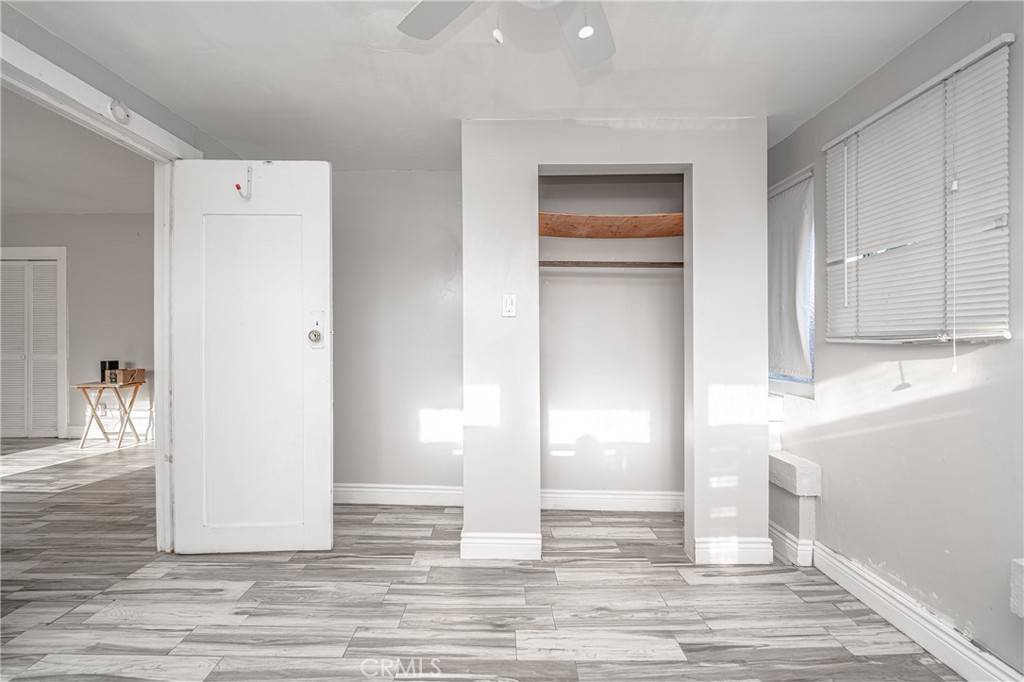430 Rose Avenue Long Beach, CA 90802 - Photo 14 of 20 a view of a livingroom with wooden floor and closet