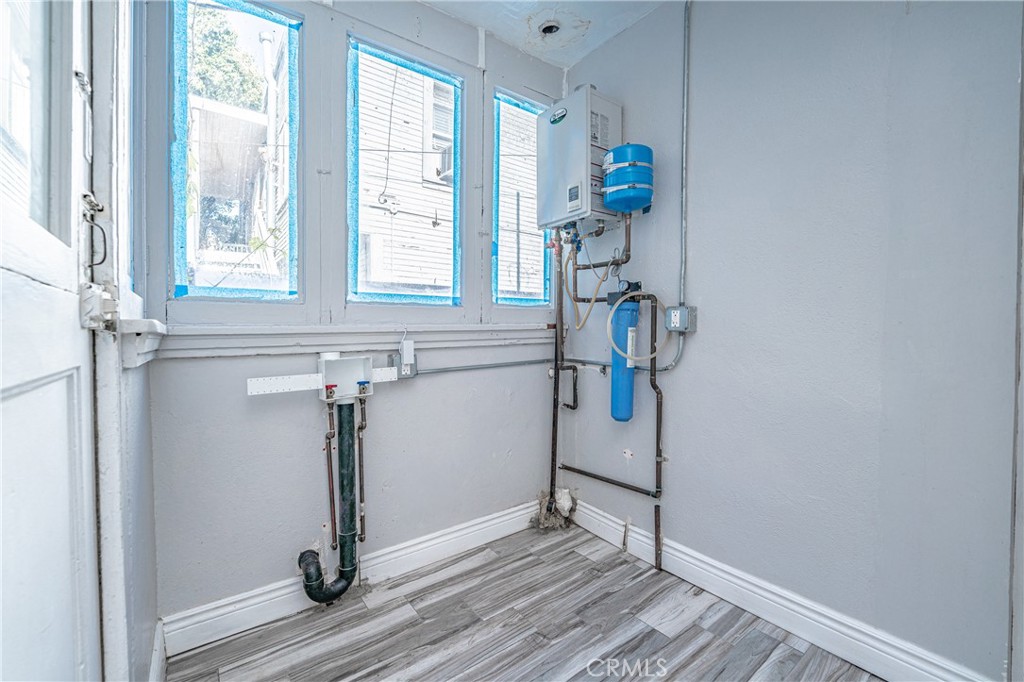430 Rose Avenue Long Beach, CA 90802 - Photo 20 of 20 a view of empty room with wooden floor and fan