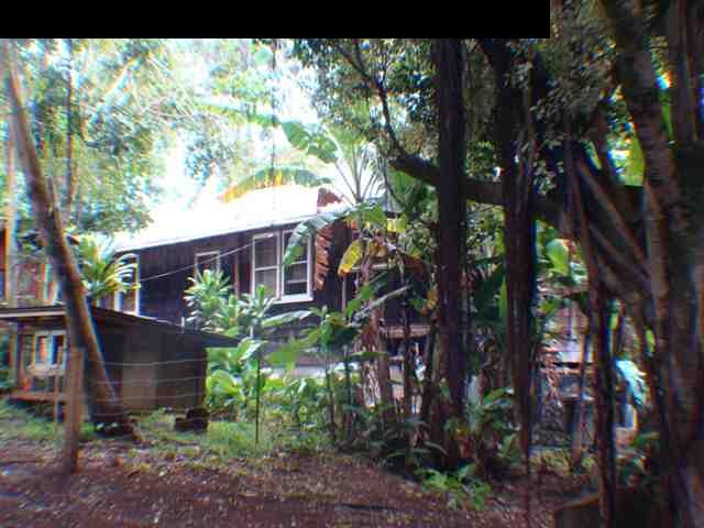 323 Hahana Road Haiku, HI 96708 - Photo 6 of 12 a front view of a house with a yard