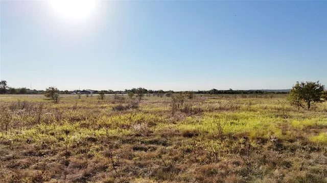 an aerial view of beach and ocean