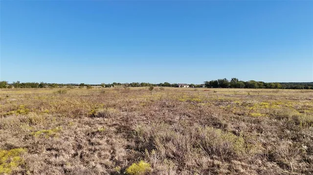 a view of mountain with lake view