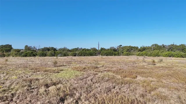 a view of lake with mountain in background