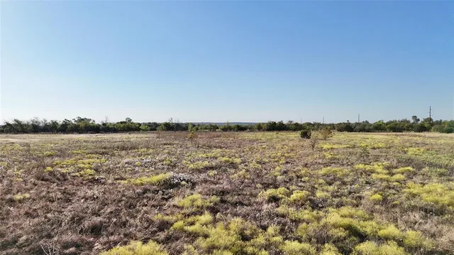 a view of lake with mountain in background
