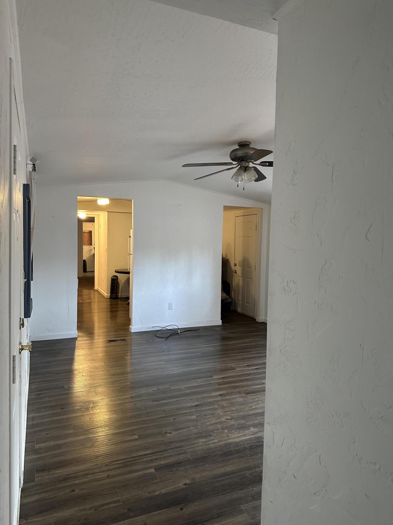 60901 Brosterhous Road, Unit 743 Bend, OR 97702 - Photo 8 of 24 HALL TO LIVING ROOM