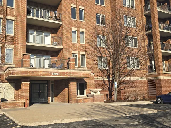 a view of a building with a street