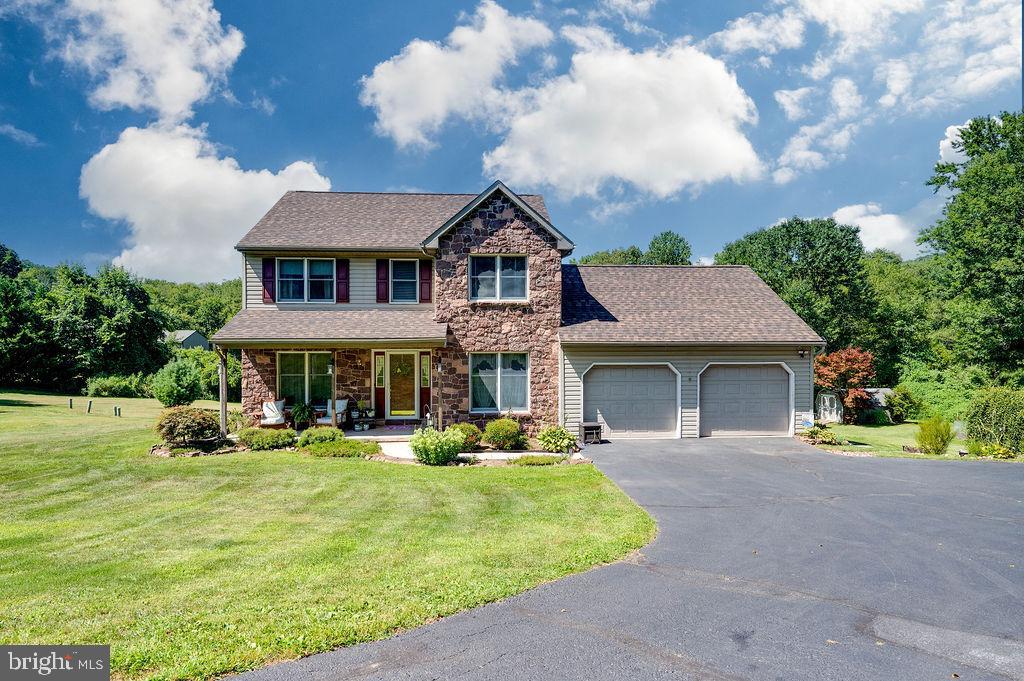 881 Zion Road Mohnton, PA 19540 - Photo 1 of 64 Charming stone home amidst lush greenery.