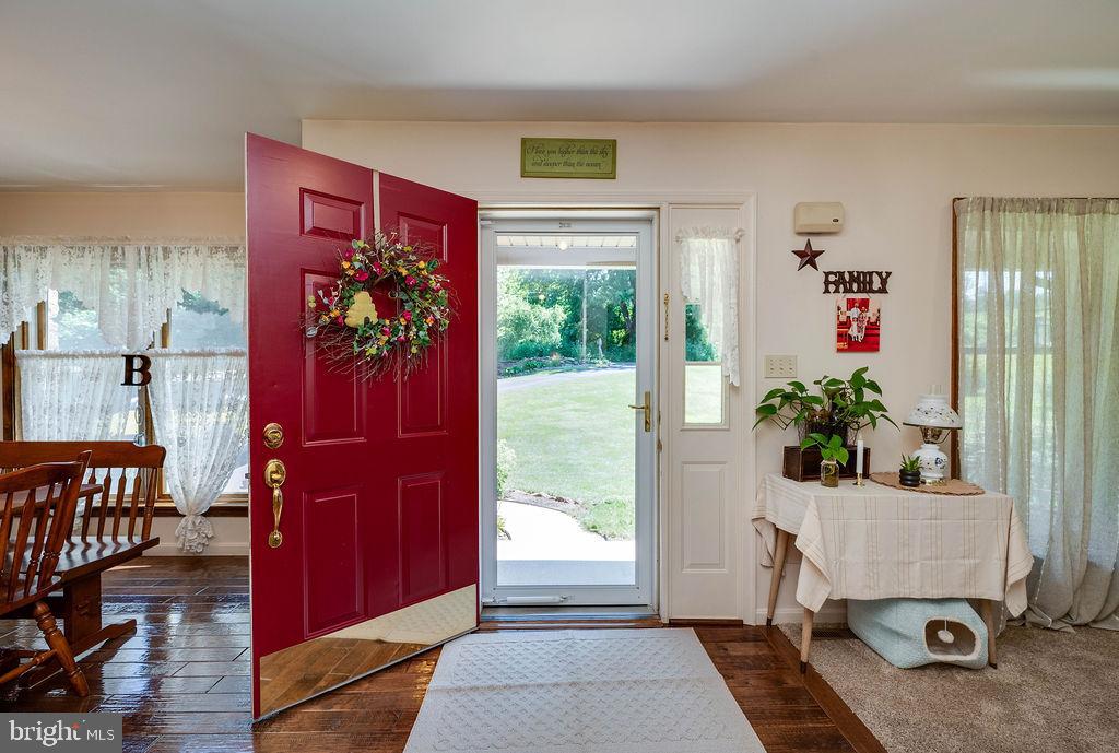 881 Zion Road Mohnton, PA 19540 - Photo 2 of 64 Welcoming entryway with vibrant red door.