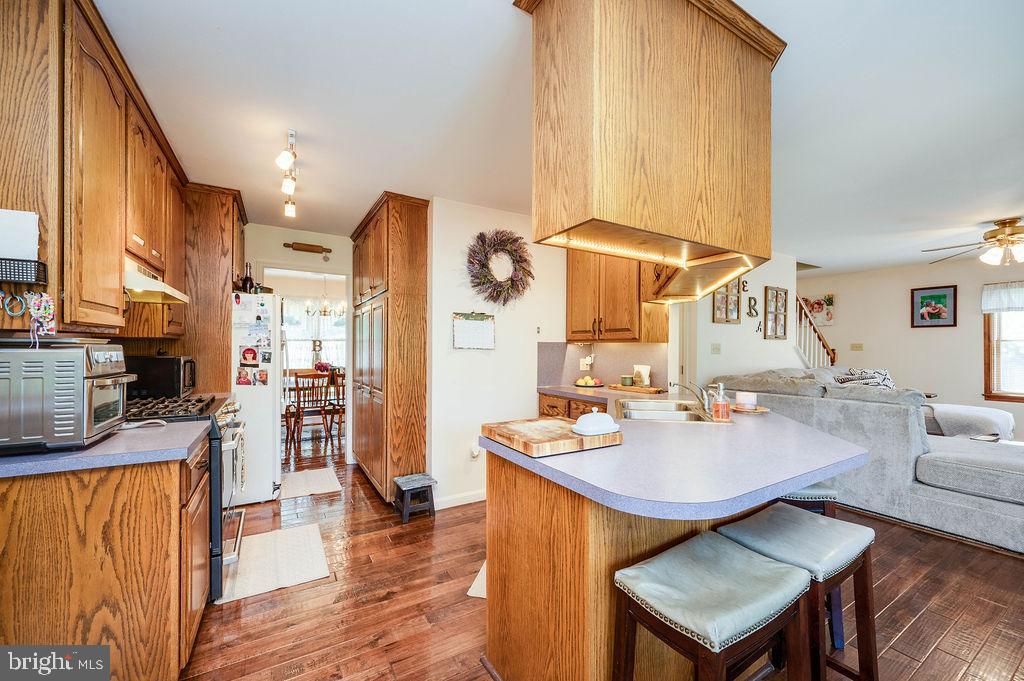 881 Zion Road Mohnton, PA 19540 - Photo 21 of 64 Warm and inviting kitchen with rich wood tones.